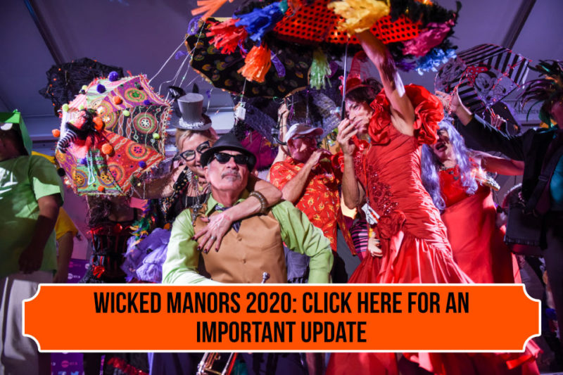 Wicked Manors Important Update: Costume Contest Photo by Carina Mask - group of costumed people on stage during Wicked Manors